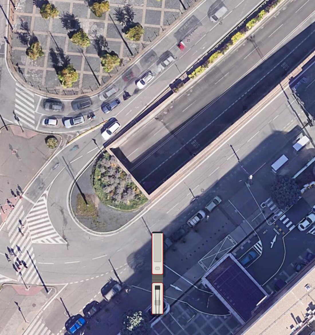 Top-down satellite view of Hodžovo námestie in Bratislava with an articulated Škoda 15Tr trolleybus drawn at a stop.